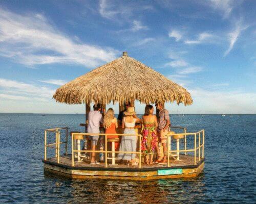 Complimentary Crab Island Tiki Boat Cruise Included